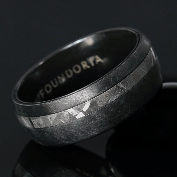 Nyx black zirconium ring with an offset meteorite line